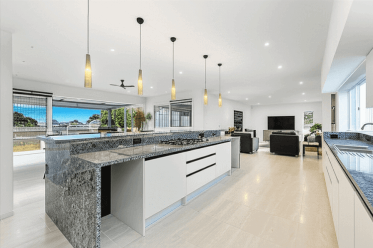 Modern kitchen with island bench in a Porirua home showcasing contemporary kitchen renovation design