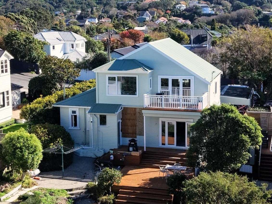 Aerial view of a completed Clearcut home renovation in Wellington with new deck and weatherboard cladding