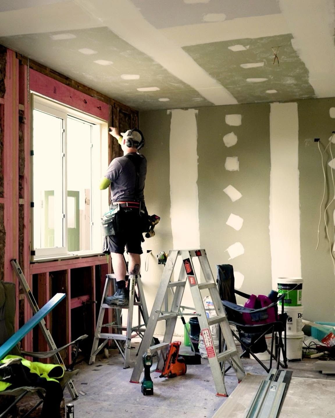 Builder on site carrying out restricted building work during a Wellington home renovation